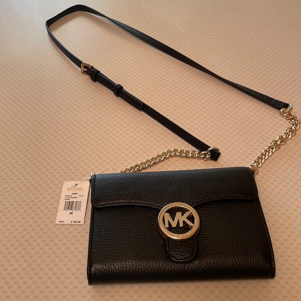 Michael Kors brand new black wallet on a chain with removable chain.